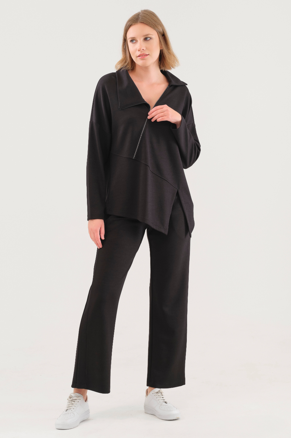 Dolcezza Asymmetrical Hem Zip Sweater in Black