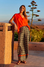 Load image into Gallery viewer, Lauren Vidal Poki Print Trousers and Ticky Top in Orange
